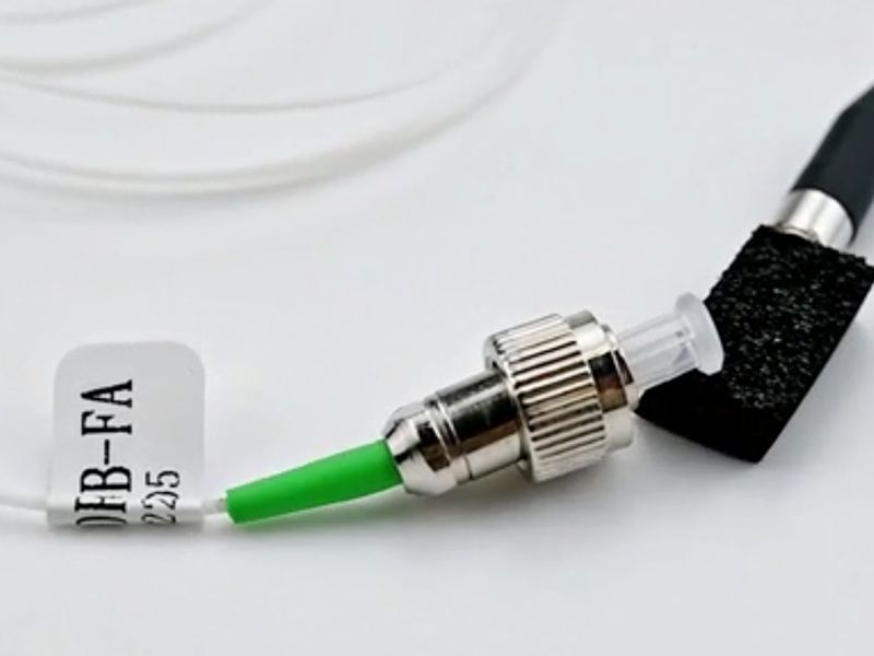 Détecteur de couplage de fibre optique